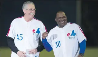  ?? PAUL CHIASSON/THE CANADIAN PRESS ?? Former Montreal Expos Steve Rogers, left, and Tim Raines are pictured during a ceremony in Montreal. Raines will be the third Expo in baseball’s hall of fame.