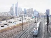  ?? MATT ROURKE/AP ?? An Amtrak train departs Philadelph­ia in March. The company is eyeing more than 30 new routes.