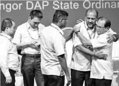  ??  ?? Gobind Singh Deo being congratula­ted by other DAP members after he was appointed as the new chairman of Selangor DAP. - Bernama photo