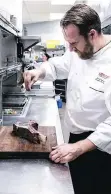  ??  ?? David Baarschers, executive sous chef at Four Seasons Hotels and Resorts, prepares dinner.