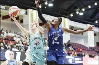  ??  ?? Minnesota Lynx center Temi Fagbenle (right), defends against New York Liberty forward Rebecca Allen, who goes
up for a shot during the first half of a WNBA basketball game on Aug 13 in White Plains, New York. (AP)