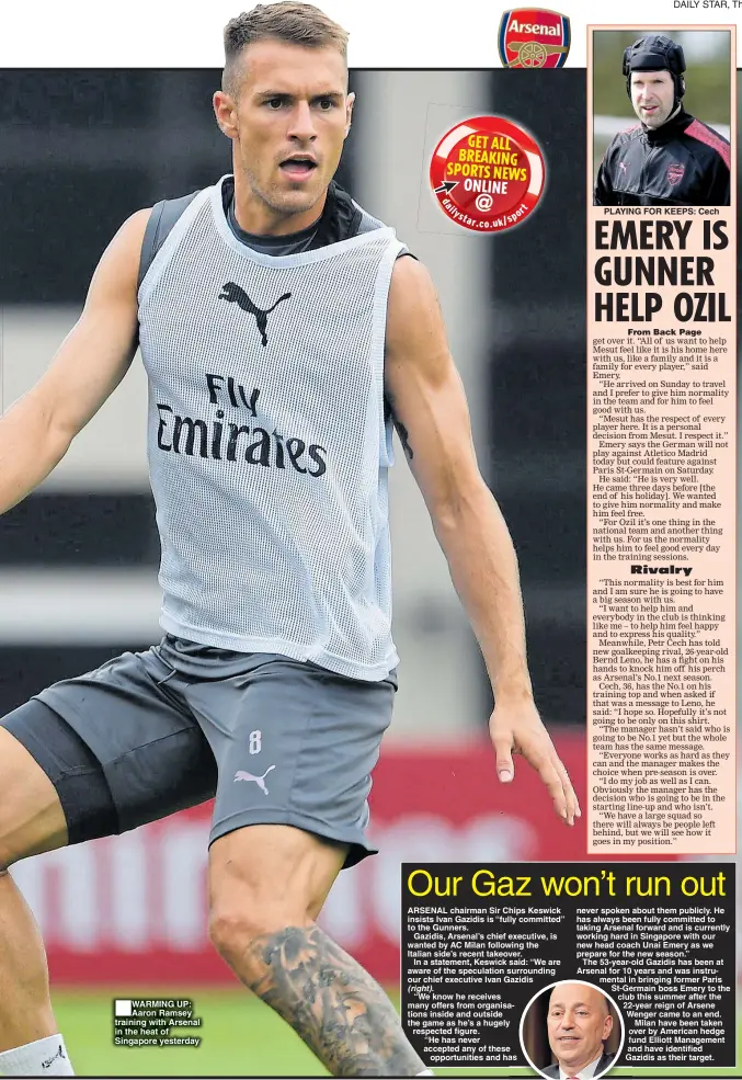 ??  ?? WARMING UP: Aaron Ramsey training with Arsenal in the heat of Singapore yesterday PLAYING FOR KEEPS: Cech