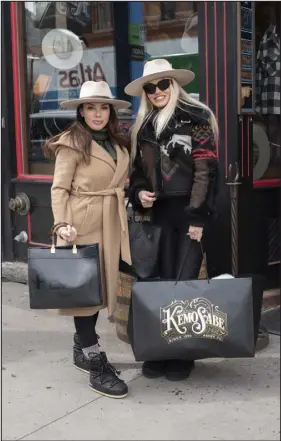  ?? ?? Nicole Carner and Erin Omiatek in matching hats from Kemo Sabe, on March 5.