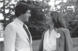  ?? PHOTOS / GETTY IMAGES ?? Hillary Rodham in 1969 as a student at Wellesley College, top, and with Bill Clinton. Rodham, A Novel, by Curtis Sittenfeld (Penguin Random House, $37).