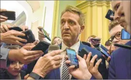  ?? Bill O’Leary Washington Post ?? SEN. JEFF FLAKE (R-Ariz.) insisted Friday on an FBI investigat­ion into sexual assault allegation­s against Supreme Court nominee Brett Kavanaugh.