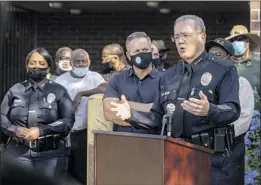  ?? Mel Melcon Los Angeles Times ?? THE LOW number of recorded complaints is misleading, says Chief Michel Moore, right, adding that the department will ref ine its reporting systems.