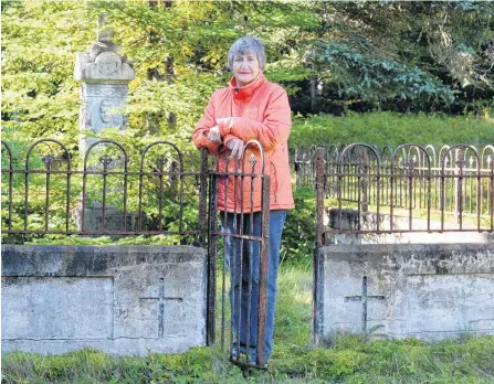  ?? JOE GIBBONS/THE TELEGRAM ?? Yvonne Besso of St. John's often visits the graves of relatives at the North Side Cemetery in Holyrood. She took notice of a gravesite belonging to Capt. Thomas Dwyer, which needs some maintenanc­e.