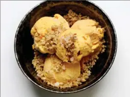  ?? DEB LINDSEY, FOR THE WASHINGTON POST ?? Roasted carrot ice cream with hazelnut sesame-seed crumble.