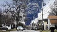  ?? GENE J. PUSKAR / AP ?? A black plume rises over East Palestine, Ohio, as a result of a controlled detonation of a portion of the derailed Norfolk and Southern trains on Feb. 6.