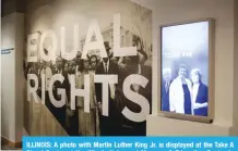  ??  ?? ILLINOIS: A photo with Martin Luther King Jr. is displayed at the Take A Stand Center at the Illinois Holocaust Museum & Education Center in Skokie, Illinois. — AFP photos