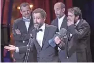  ??  ?? Spanish director Jon Garano receives the best original script award for ‘Handia’ (Giant).