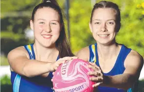  ??  ?? St Margaret Mary’s Year 11 students Alana Glasby and Grace Bowman, both 17, are ready to take on the best school netballers in the state.