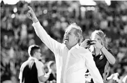  ?? JACOB LANGSTON/STAFF PHOTOGRAPH­ER ?? Former Orlando City coach Adrian Heath, seen here celebratin­g with fans after a 2016 game, returned to Orlando as coach of Minnesota United FC. He still has a home here.