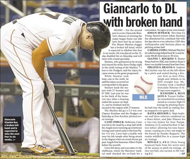  ?? AP ?? Giancarlo Stanton has a broken left hand and is expected to miss the next four to six weeks.