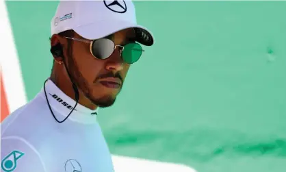  ??  ?? Eight members of F1 world champion Lewis Hamilton’s Mercedes team were robbed at gunpoint after Sunday’s Brazilian Grand Prix. Photograph: Mark Thompson/Getty Images