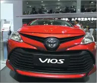 ?? SHI YAN / FOR CHINA DAILY ?? A Toyota Vios car is displayed at an auto expo in Hainan province.