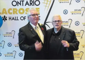  ?? SUBMITTED PHOTO ?? Mark Vitarelli at the Ontario Lacrosse Hall of Fame induction ceremony Saturday in Niagara Falls with Major Series Lacrosse communicat­ions director Rad Joseph who nominated Vitarelli.