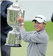  ?? Picture: REUTERS / KELVIN KUO ?? ON A ROLL: 2020 PGA Championsh­ip winner Collin Morikawa plays the third hold of the final round and later celebrates by lifting the Wanamaker Trophy at TPC Harding Park in San Francisco at the weekend.