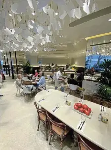  ?? /John Fraser ?? High standards: The newly opened Battersea tashas restaurant in London has a similar look and feel, and food, to the cosmopolit­an, Mediterran­eanthemed Johannesbu­rg and Pretoria outlets.