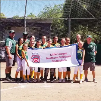  ?? Courtesy Photo ?? Members of the Olivehurst-linda Little League softball team celebrate after wining the Norcal state championsh­ip last weekend.