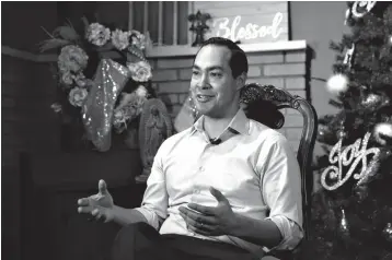  ?? Associated Press ?? ■ Democrat Julian Castro talks about exploring the possibilit­y of running for president in 2020 on Tuesday at his home in San Antonio. The announceme­nt Wednesday gives the 44-year-old Castro a jump-start on what’s likely to be a crowded Democratic primary field that has no clear front-runner. He tells The Associated Press he plans to announce his ultimate decision in early January.