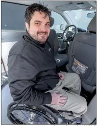  ?? Arkansas Democrat-Gazette/JOHN SYKES JR. ?? Adapting to the challenges of paraplegia, Brent Adams works in the business office of 10 Fitness Health Club, ensuring the employees get their health benefits.