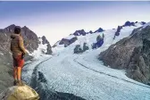  ??  ?? Kevin Arnold backpackin­g the Hoh River Trail to the Blue Glacier at Olympic National Park in Washington.