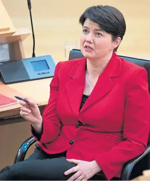  ??  ?? BATTLEGROU­ND: Nicola Sturgeon, left, has been questioned by Ruth Davidson on the use of the military in the vaccinatio­n rollout.