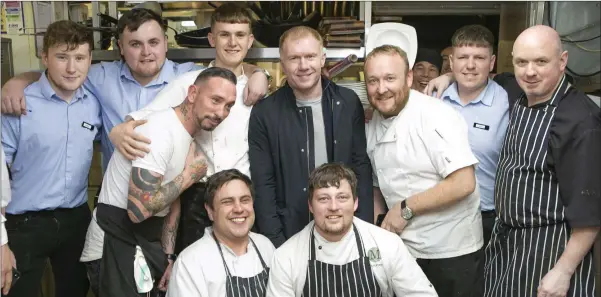  ??  ?? Kitchen staff from the Martello in Bray with Manchester United legend Paul Scholes during his visit to Wicklow in aid of the Wicklow Hospice Foundation