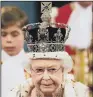  ??  ?? CROWN JEWEL: The Queen wears the Imperial State Crown which features a Cullinan stone.