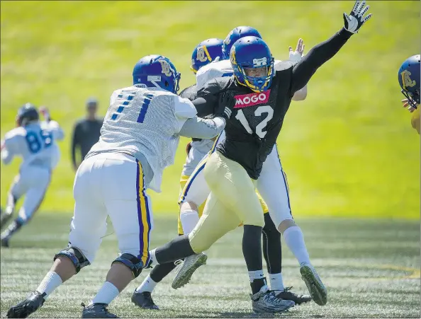  ?? PHOTOS: ARLEN REDEKOP/PNG ?? Defensive lineman Charles Nwoye in action at Thunderbir­d Stadium last month. Over the weekend, Nwoye watched with interest as the New Orleans Saints selected 6-foot-4, 300-pound David Onyemata, also from Lagos, in the fourth round of the NFL draft