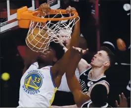  ?? KATHY WILLENS — THE ASSOCIATED PRESS ?? Warriors center James Wiseman brings a big bump in defensive ability when he is on the court, according to NBA.coms Advanced Stats.