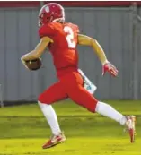  ??  ?? Lakeview-Fort Oglethorpe’s Gabe Smith (2) runs for a touchdown on Friday.