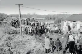  ?? ?? Left: A crowd gathers to watch the arrival of the heritage stock at Havenstree­t in 1971. IOWSR