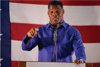  ?? ?? Herschel Walker speaks at a campaign rally in Dalton, Georgia, on Wednesday. Photograph: Cheney Orr/Reuters