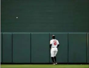  ?? PATRICK SEMANSKY — THE ASSOCIATED PRESS ?? Orioles center fielder Adam Jones watches as a solo home run by the Phillies’ Jorge Alfaro sails over the outfield wall in the sixth inning Thursday in Baltimore.