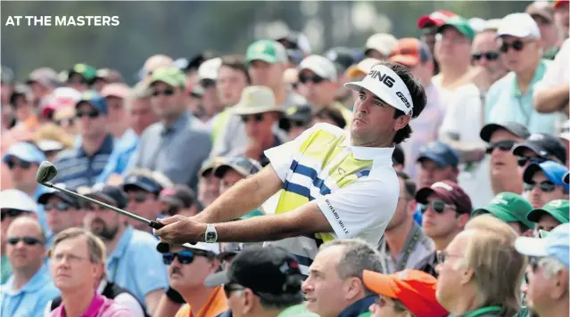  ?? ANDREW REDINGTON/ GETTY IMAGES ?? American Bubba Watson plays his third shot on the 18th hole Friday during the second round of the 2014 Masters Tournament at Augusta National Golf Club. He ended Friday on top of the leaderboar­d.