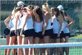  ?? File Photo ?? The Calhoun girls tennis team huddles after their win over Lovett in the Final Four in May to advance to their first-ever state finals.