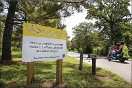  ?? RALPH BARRERA / AMERICAN-STATESMAN ?? A sign at Bastrop State Park touts park improvemen­ts, thanking the Texas Legislatur­e for the funding. The Parks Department reports that it has more than $580 million in backlogged maintenanc­e projects at 91 state parks.