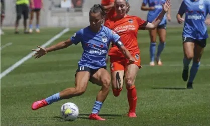  ?? Photograph: Rick Bowmer/AP ?? The Chicago Red Stars’ Sarah Gorden, front, plays the ball as the Houston Dash’s Bri Visalli defends during the second half of an NWSL Challenge Cup match last year.