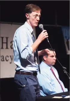  ?? Arnold Gold / Hearst Connecticu­t Media ?? New Haven Mayor Justin Elicker, left, debates challenger John Carlson at Cooperativ­e Arts & Humanities High School in New Haven on Tuesday.