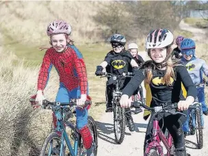  ??  ?? ●● Children took to their bikes as part of the national Big Pedal Challenge organised by Sustrans at the end of April
