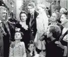  ?? JOURNAL SENTINEL FILES ?? George Bailey (James Stewart, center) gets a little help from his friends, and an angel, in “It’s a Wonderful Life.”