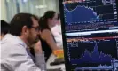  ??  ?? A graph shows the falling value of sterling at the offices of CMC Markets in the City of London. Photograph: Daniel Sorabji/AFP/ Getty Images