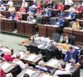  ?? CHRIS YOUNG/THE CANADIAN PRESS ?? Ontario MPPs sport jerseys on Thursday in tribute to the victims of the Humboldt Broncos bus crash.