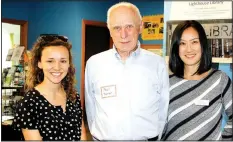  ?? NWA Democrat-Gazette/CARIN SCHOPPMEYE­R ?? Amber Hicks (from left), Paul Trainer and Mina Phebus gather at the Ozark Literacy Council open house.