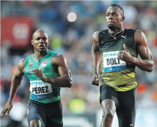  ?? — THE ASSOCIATED PRESS ?? Usain Bolt defeated Yunier Perez of Cuba by just 0.03 seconds to win a100-metre race on Wednesday.