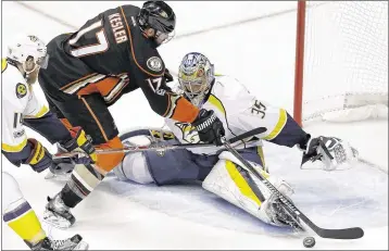  ?? CHRIS CARLSON / AP ?? Ducks center Ryan Kesler can’t shoot past Predators goaltender Pekka Rinne during the first period of Game 5 in the Western Conference finals. Two third-period goals made the difference in Nashville’s win.