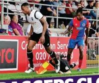  ?? REX IMAGES ?? Knock out: Salford’s Touray (left) and McQueen collide with the match official at Dagenham