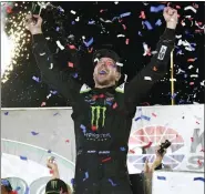  ?? TIMOTHY D. EASLEY — THE ASSOCIATED PRESS ?? Kurt Busch celebrates his win in the NASCAR Cup Series auto race at Kentucky Speedway in Sparta, Ky., Saturday.